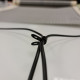 Clip for fastening ceilingo electrical cables